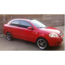 Вітровики на Chevrolet Aveo 2006-2011 Sedan Кобра Тюнинг накладні Вітровики на Chevrolet Aveo 2006-2011 Sedan Кобра Тюнинг накладні