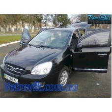 Вітровики на Kia Carens 2006-2012 передні Heko вставні під ущільнювач