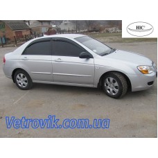 Дефлектори вікон Kia Tserato 2005-2009 HIC — накладні